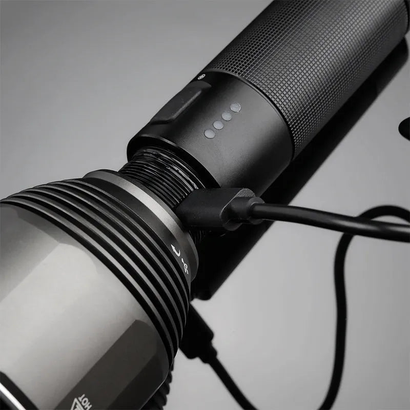 Black rechargeable flashlight with 2000 lumen output showing five lighting modes and Type-C charging port