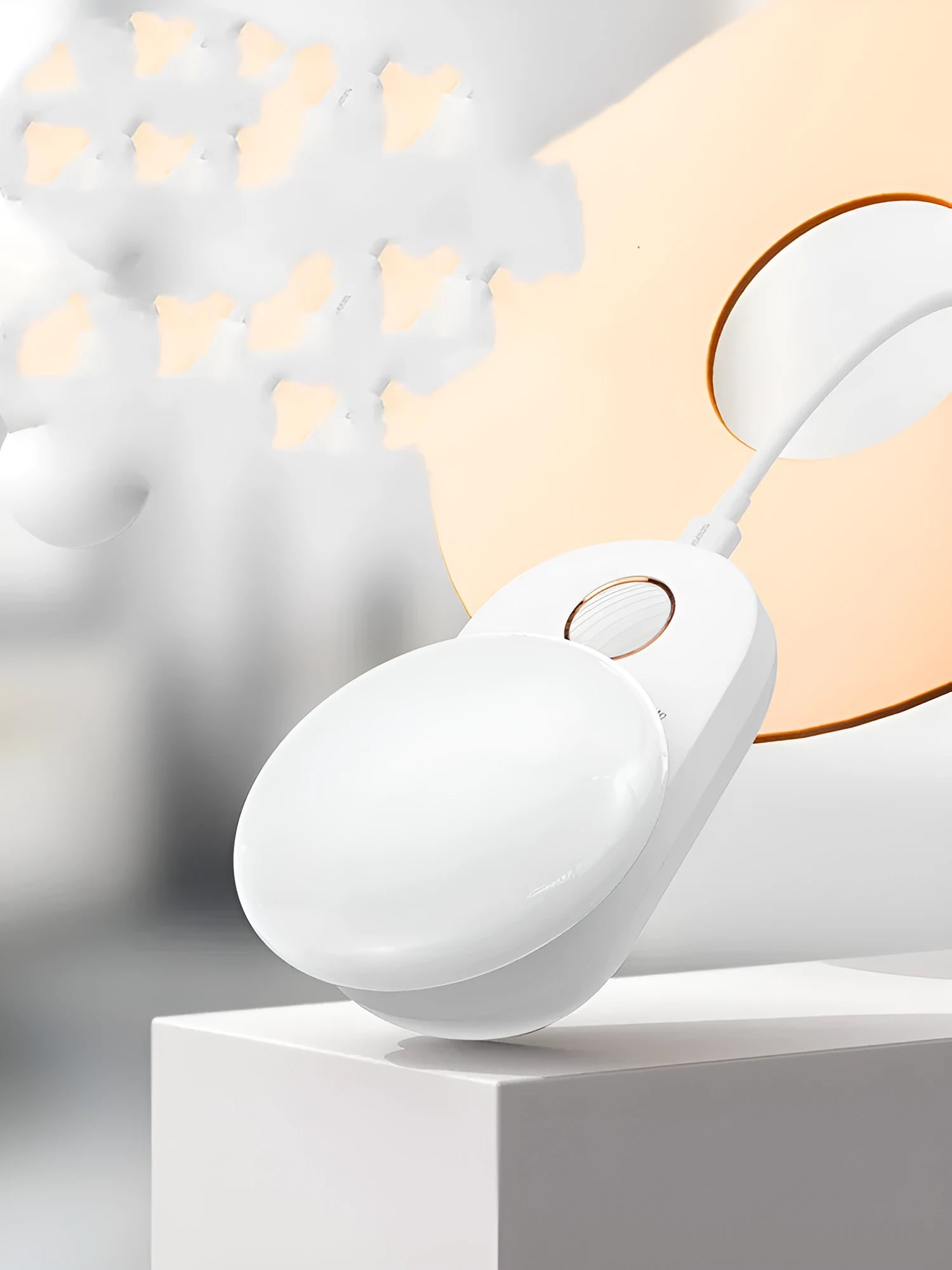 White Baseus rechargeable motion sensor bedside night light on a wooden surface.