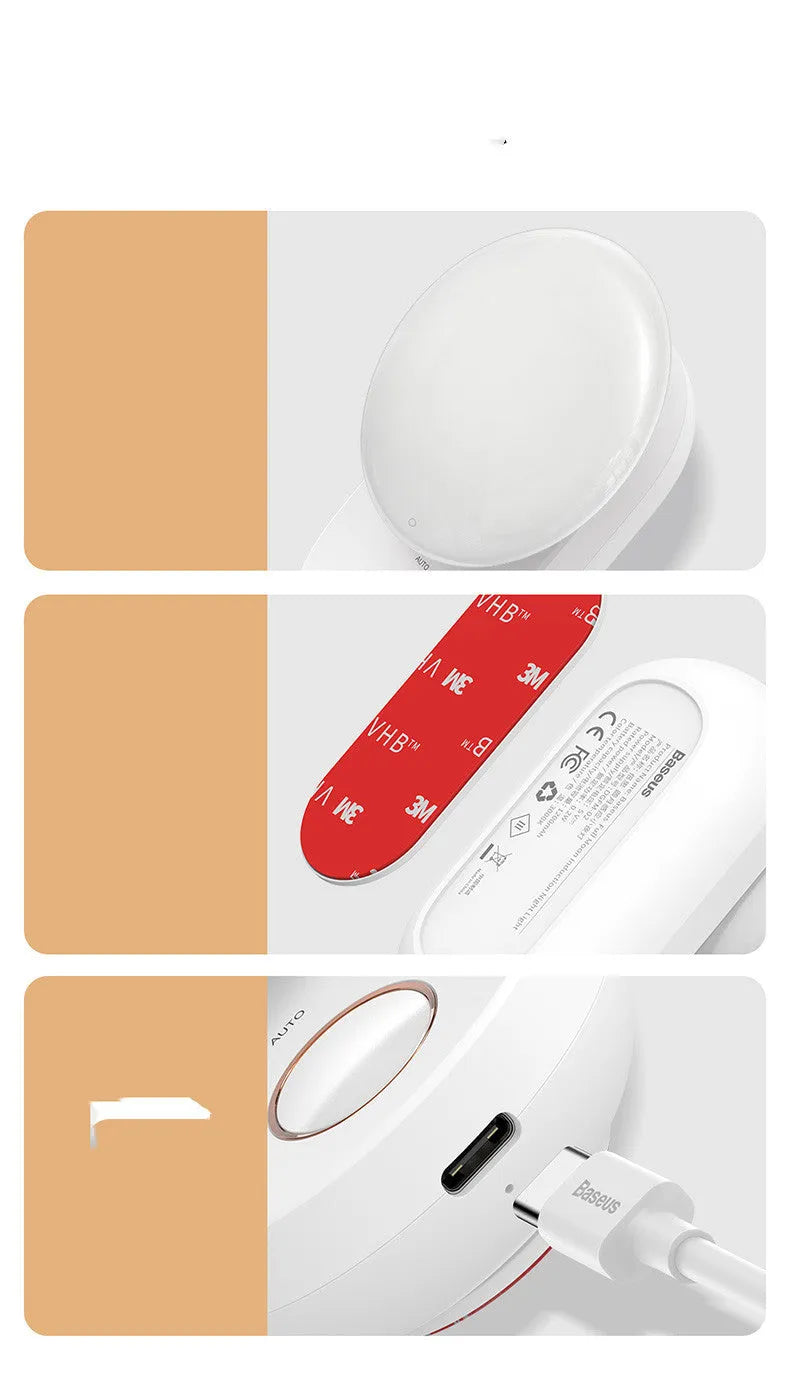 White Baseus rechargeable motion sensor bedside night light on a wooden surface.