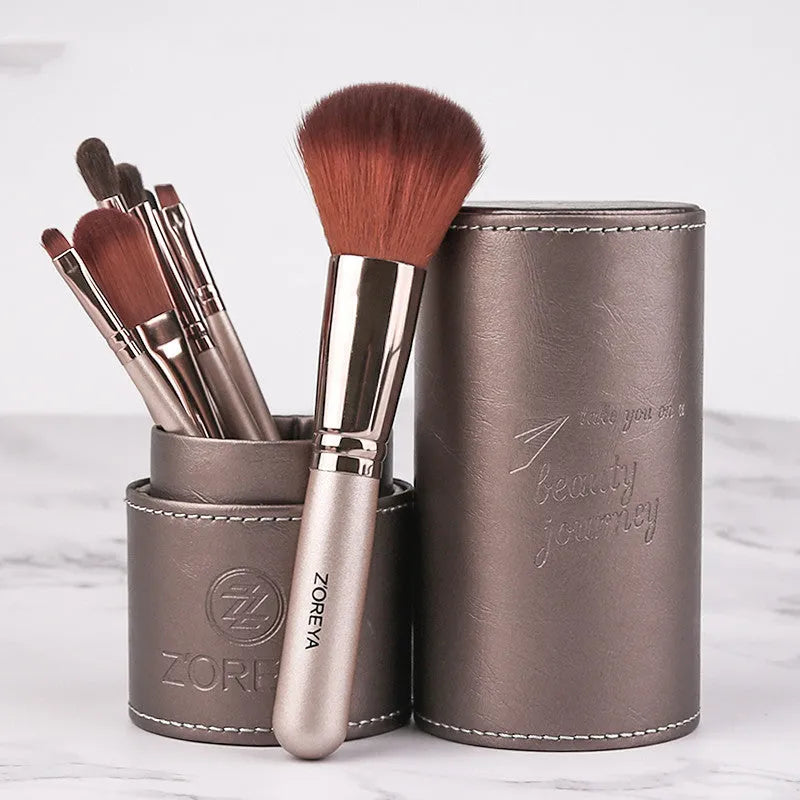 Daily makeup brush set with artificial fibre bristles and aluminium handles in black, brown, and pink