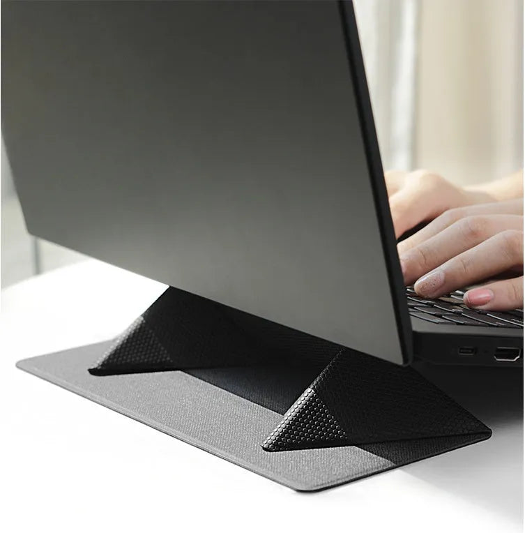 Blue foldable laptop cooling stand with anti-slip surface, shown open and closed, next to a laptop.