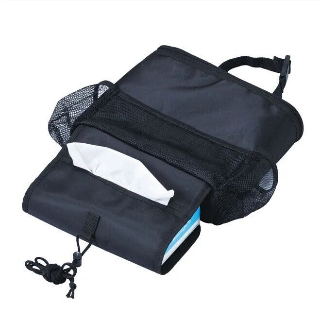 Black 600D Oxford cloth car trash storage bag with adjustable shoulder strap hanging on headrest