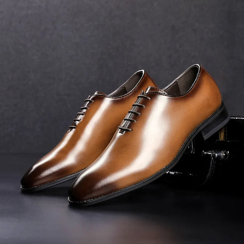 Pair of men's leather business shoes with rubber sole, small round toe, low upper, in black or brown, sizes 39-45.