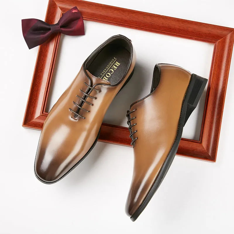 Pair of men's leather business shoes with rubber sole, small round toe, low upper, in black or brown, sizes 39-45.
