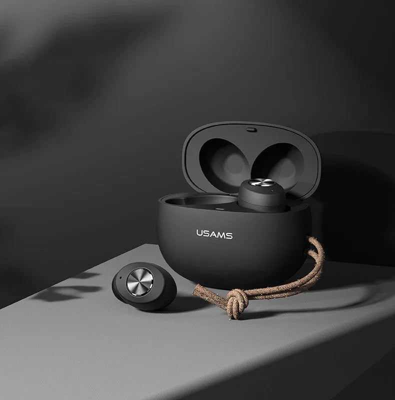 Wireless Bluetooth Mini TWS earbuds in black, white, and dark green with their compact charging case.