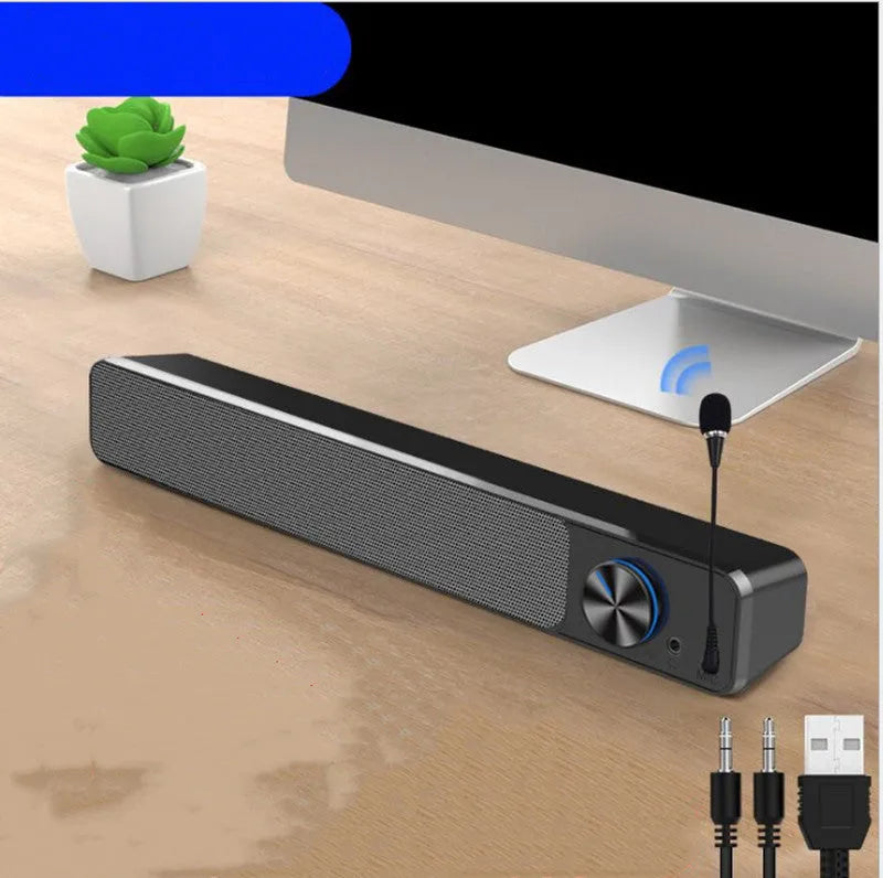 Black and white desktop wired computer speaker with ABS PC enclosure and 2.0 channel audio