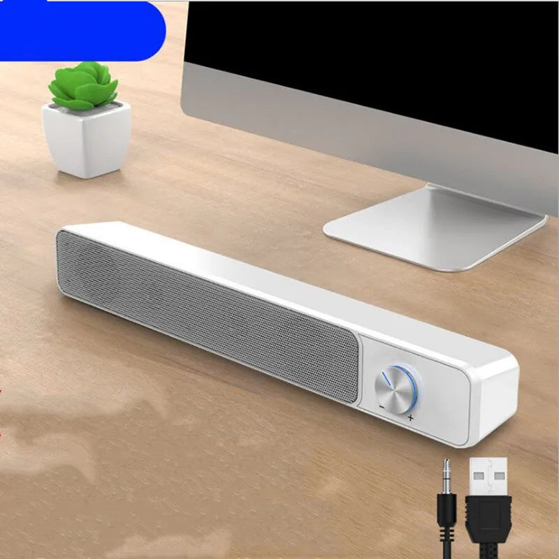 Black and white desktop wired computer speaker with ABS PC enclosure and 2.0 channel audio