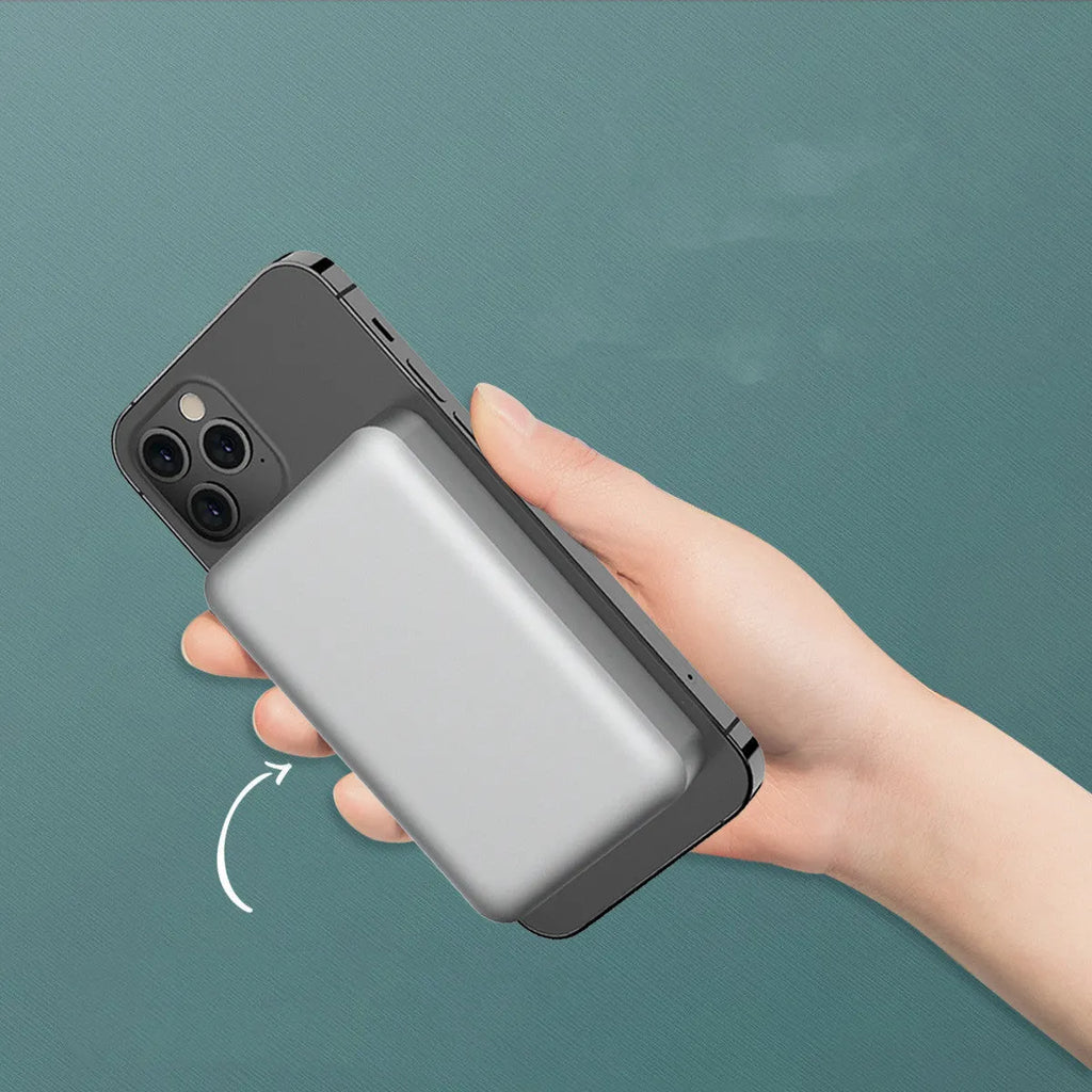 Silver aluminium Apple magnetic wireless power bank showing slim profile and USB-C port.