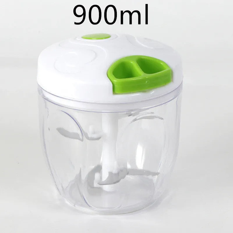 Green manual kitchen chopper with stainless steel blades and a 500ml plastic container.
