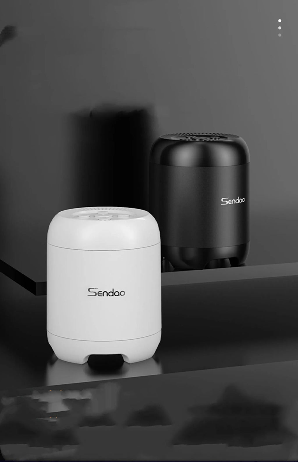 Black or white portable Bluetooth speaker with card reader slot measuring 90x73x73mm with USB charging port