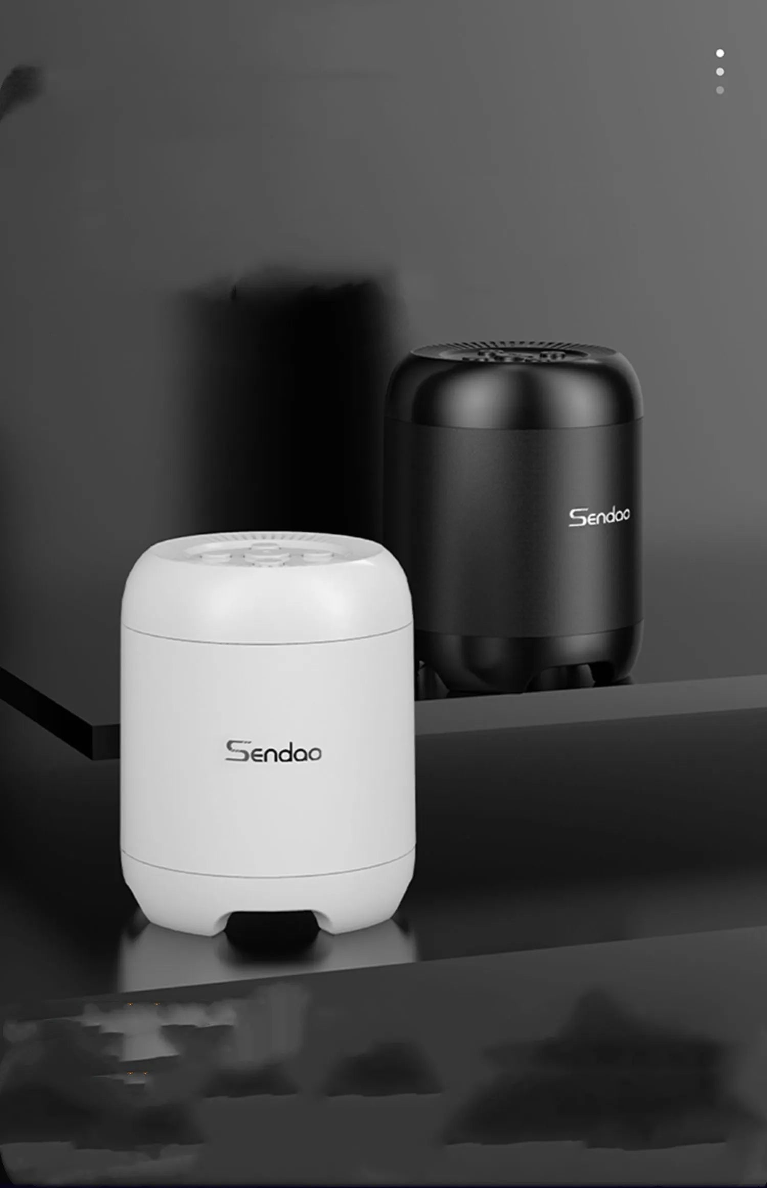 Black or white portable Bluetooth speaker with card reader slot measuring 90x73x73mm with USB charging port