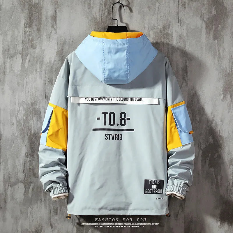 Men's grey plus size colour block hooded jacket with letter print, zip front, and side slit pockets worn casually