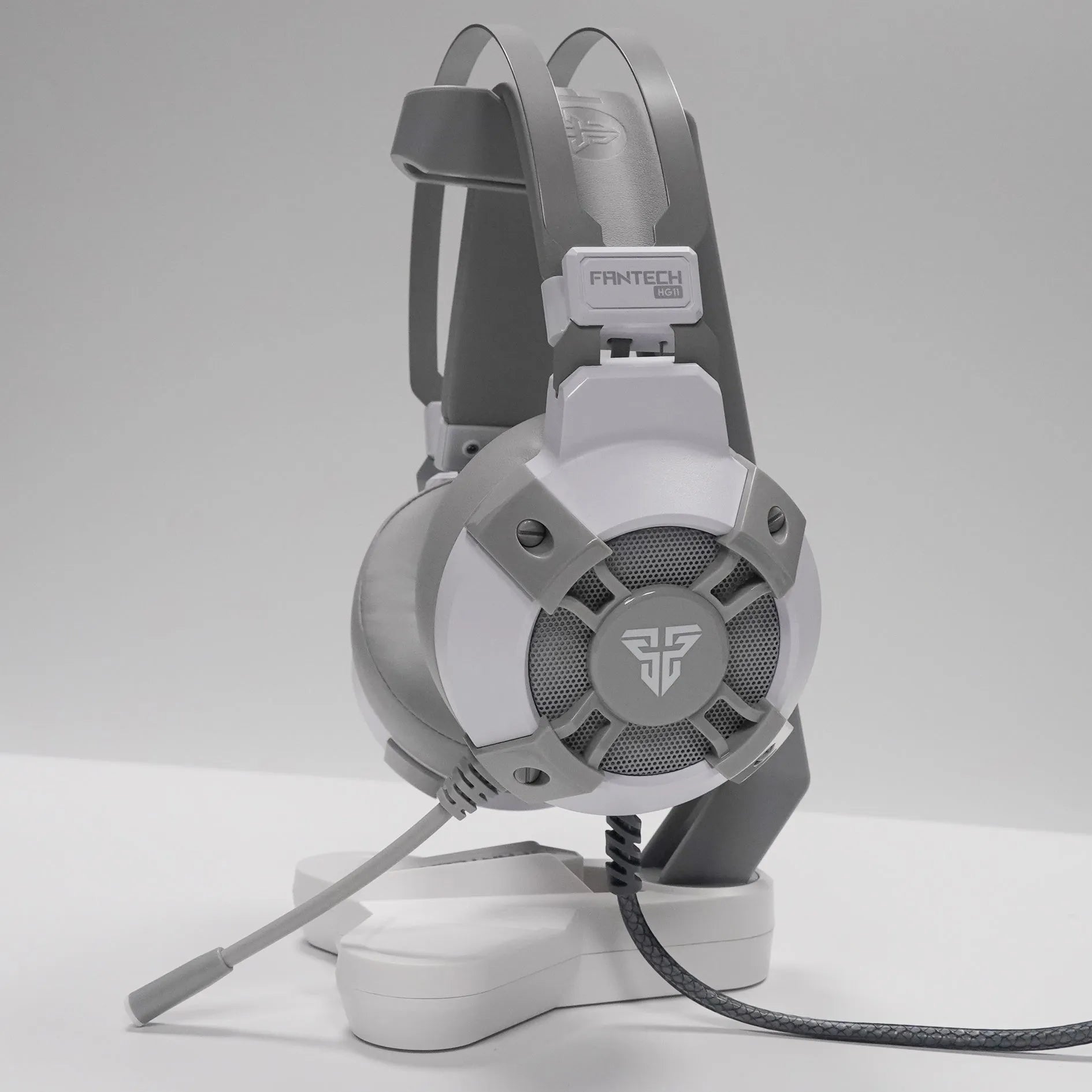 Black FANTECH HG11 USB gaming headset with RGB lights on ear cups and a 2.1m cable with remote control.