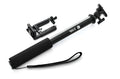 Black aluminium alloy selfie stick extended to full length with a universal mobile phone holder attached.