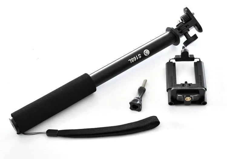 Black aluminium alloy selfie stick extended to full length with a universal mobile phone holder attached.
