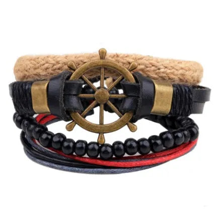 Handmade brown leather wrap bracelet with wooden beads and braided cord on a wrist.
