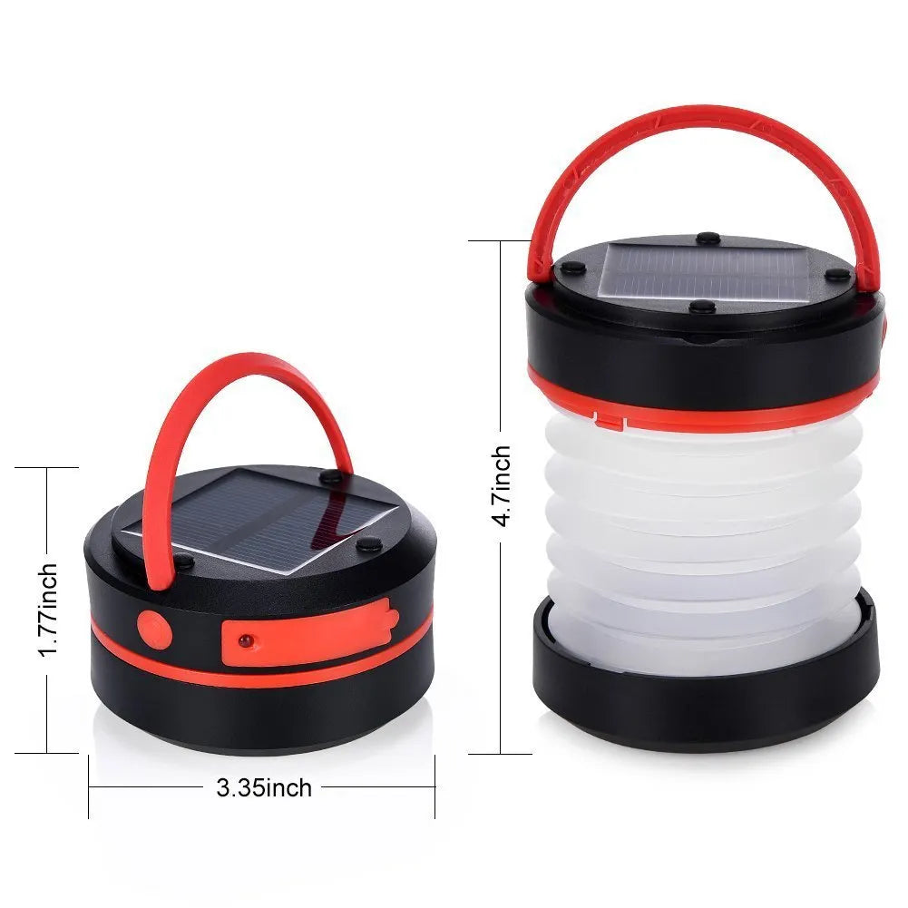SolarBoom collapsible lantern in green with solar panel, collapsed for storage, on a wooden surface