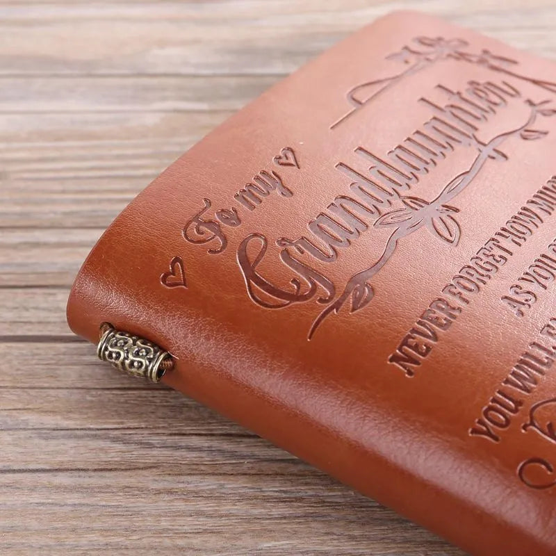 Leather business hand ledger notebook with strap binding and warm brown pages