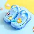 Children's PVC slippers with cartoon animal patterns in yellow, blue and pink colours