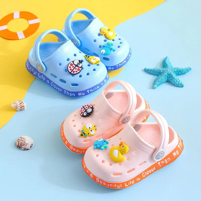 Children's PVC slippers with cartoon animal patterns in yellow, blue and pink colours