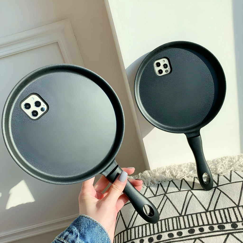 Black 3D frying pan shape iPhone case made of soft TPU and PC, back cover design.