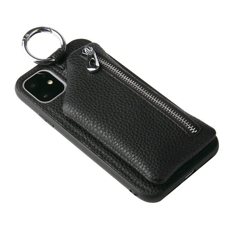 Pink imitation leather crossbody phone case with attached lanyard and zipped coin purse.