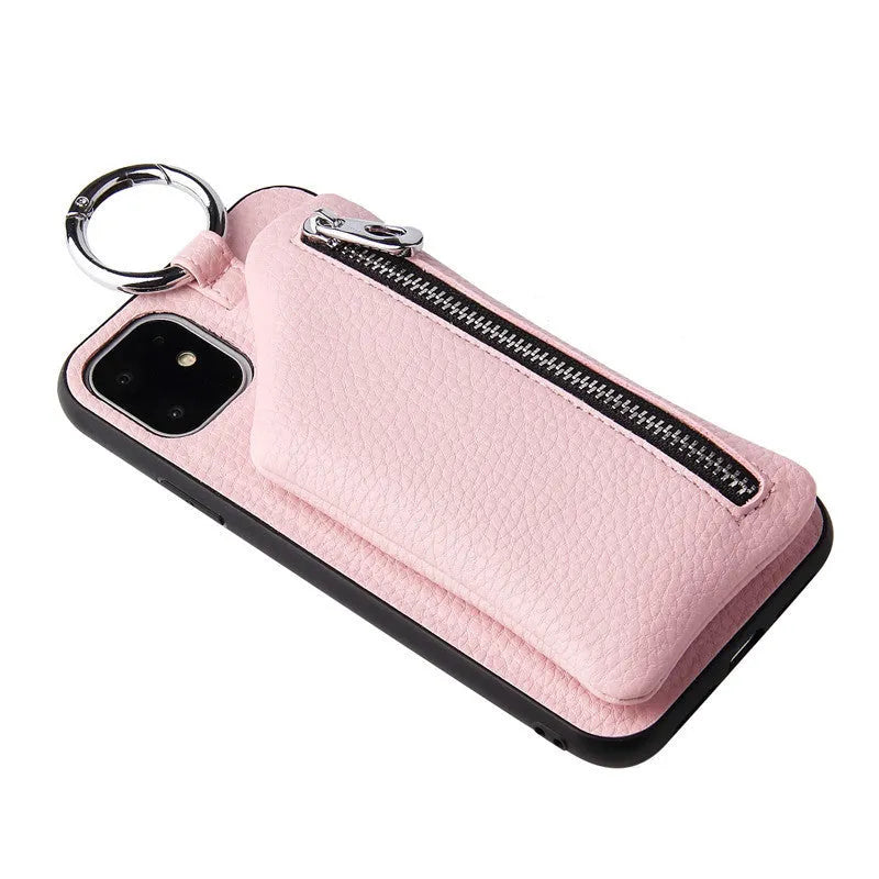 Pink imitation leather crossbody phone case with attached lanyard and zipped coin purse.