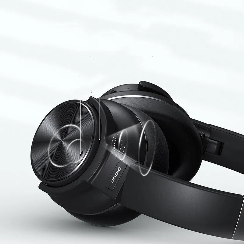 Cold black wireless Bluetooth headset with head-mounted design and all-in-ear fit for noise-cancelled listening