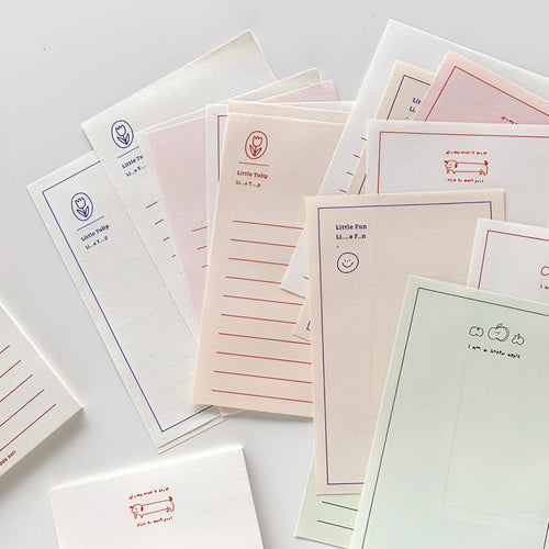 Apple-compatible memo pad notebook with colourful cover designs showing blank and lined paper options