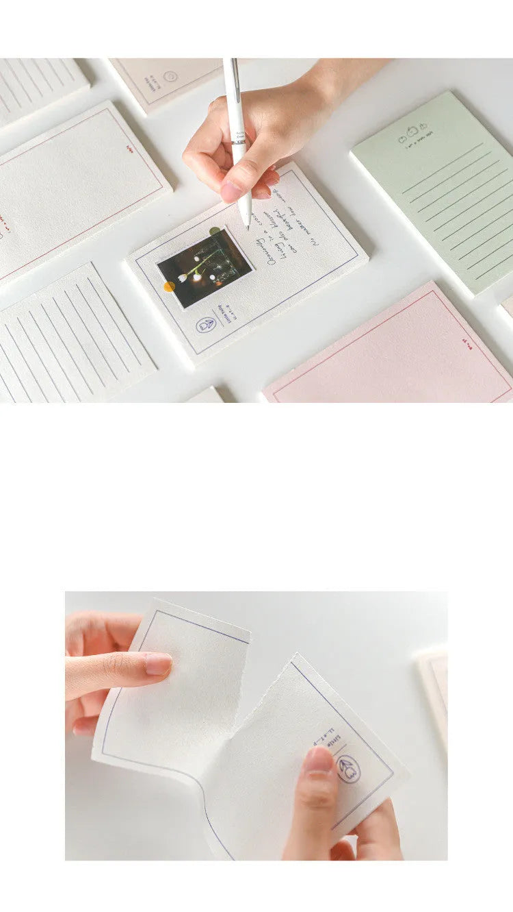 A rectangular memo pad notebook compatible with Apple iPhone, showing cover design options including blue tulip and Dogo! graphics.