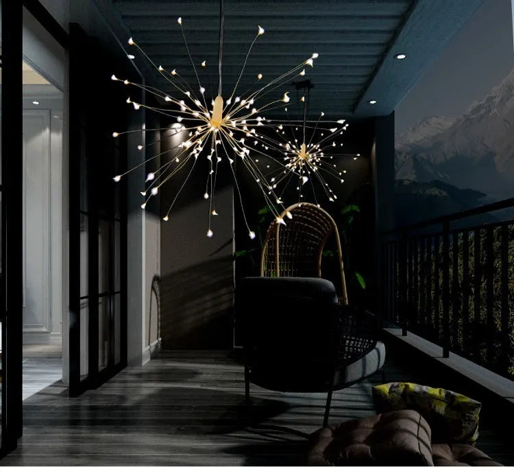 LED Meteor Shower or solar firework decoration light with multiple warm white LEDs, shown outdoors in a garden setting.