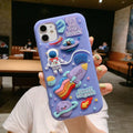 Purple silicone iPhone case with cartoon astronaut graphic for models 7, 8, X, and 11