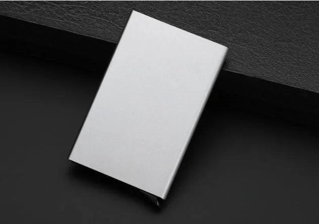 Aluminium geometric business card holder in six colour options with stainless steel elements