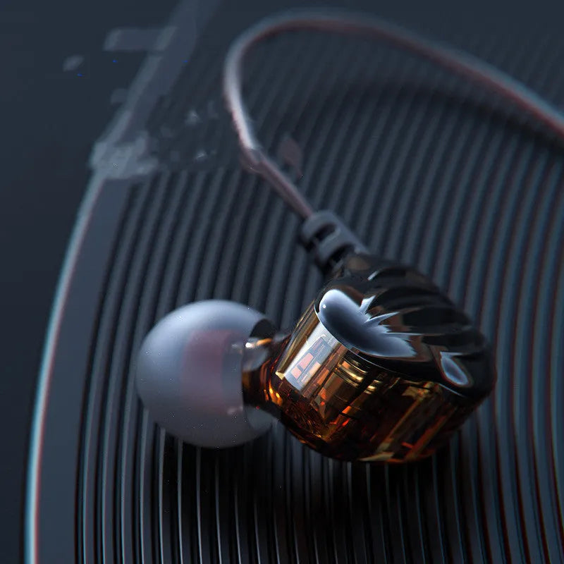 White in-ear sports headphones with a black around-ear hook and 3.5mm plug on a TPE cable.