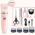 Pet wireless charging hair trimmer set in angel powder with washable cutter head, four limit combs, and ABS body, 21.5cm x 14.0cm x 6.4cm.