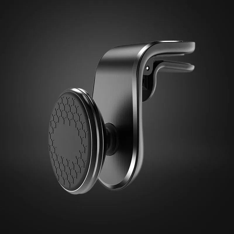 Car phone bracket mounted on vehicle air vent in silver finish showing rotation adjustment