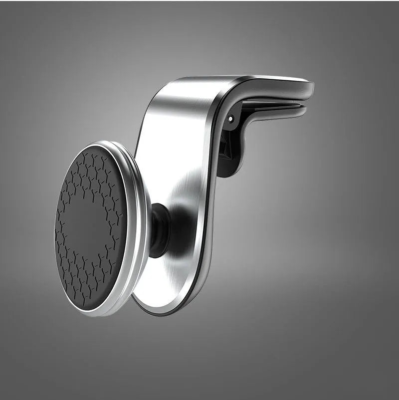 Car phone bracket mounted on vehicle air vent in silver finish showing rotation adjustment