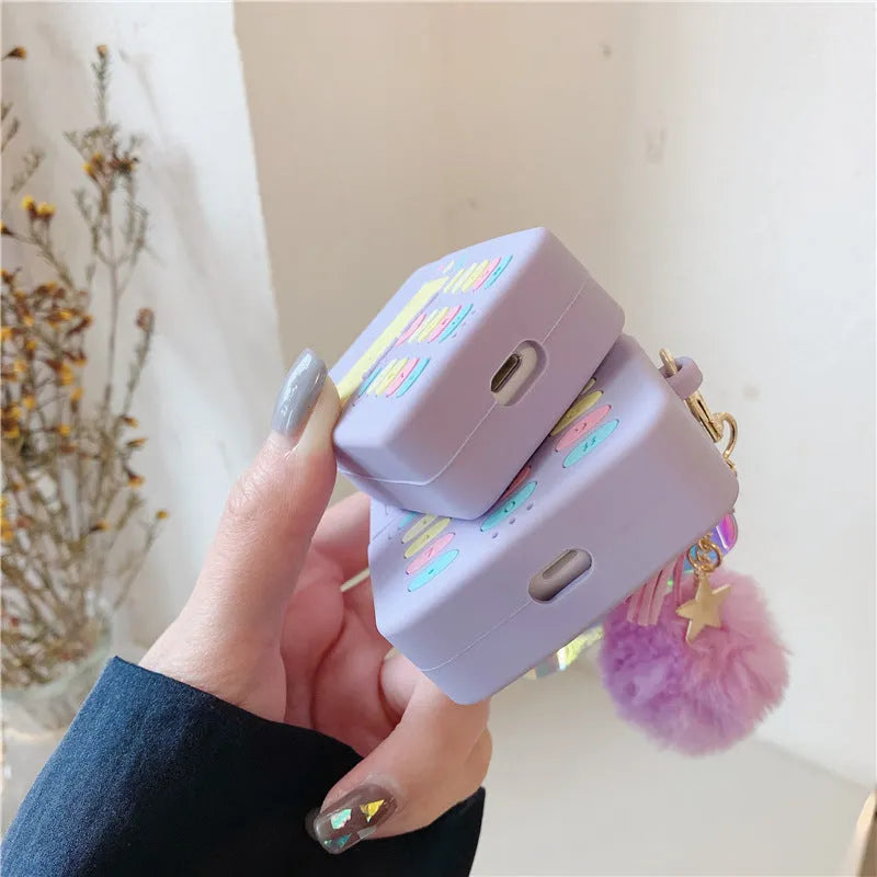 Purple silicone clamshell case with fur ball pendant for Apple AirPods wireless earphones