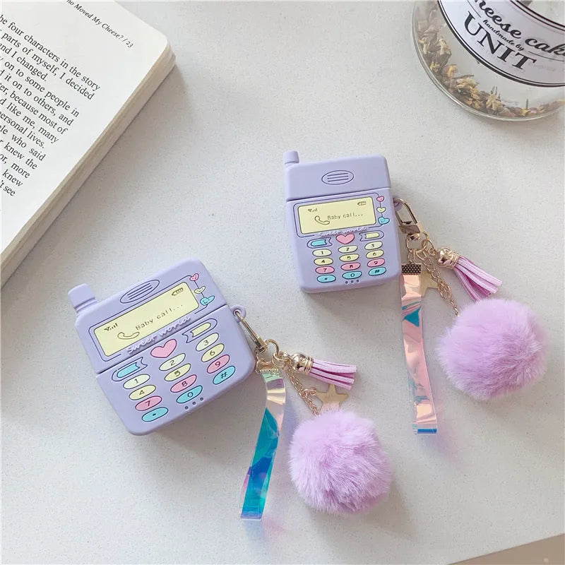 Purple silicone clamshell case with fur ball pendant for Apple AirPods wireless earphones
