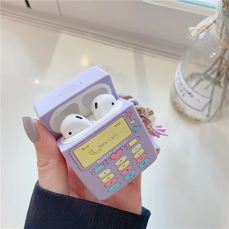 Purple silicone clamshell case with fur ball pendant for Apple AirPods wireless earphones