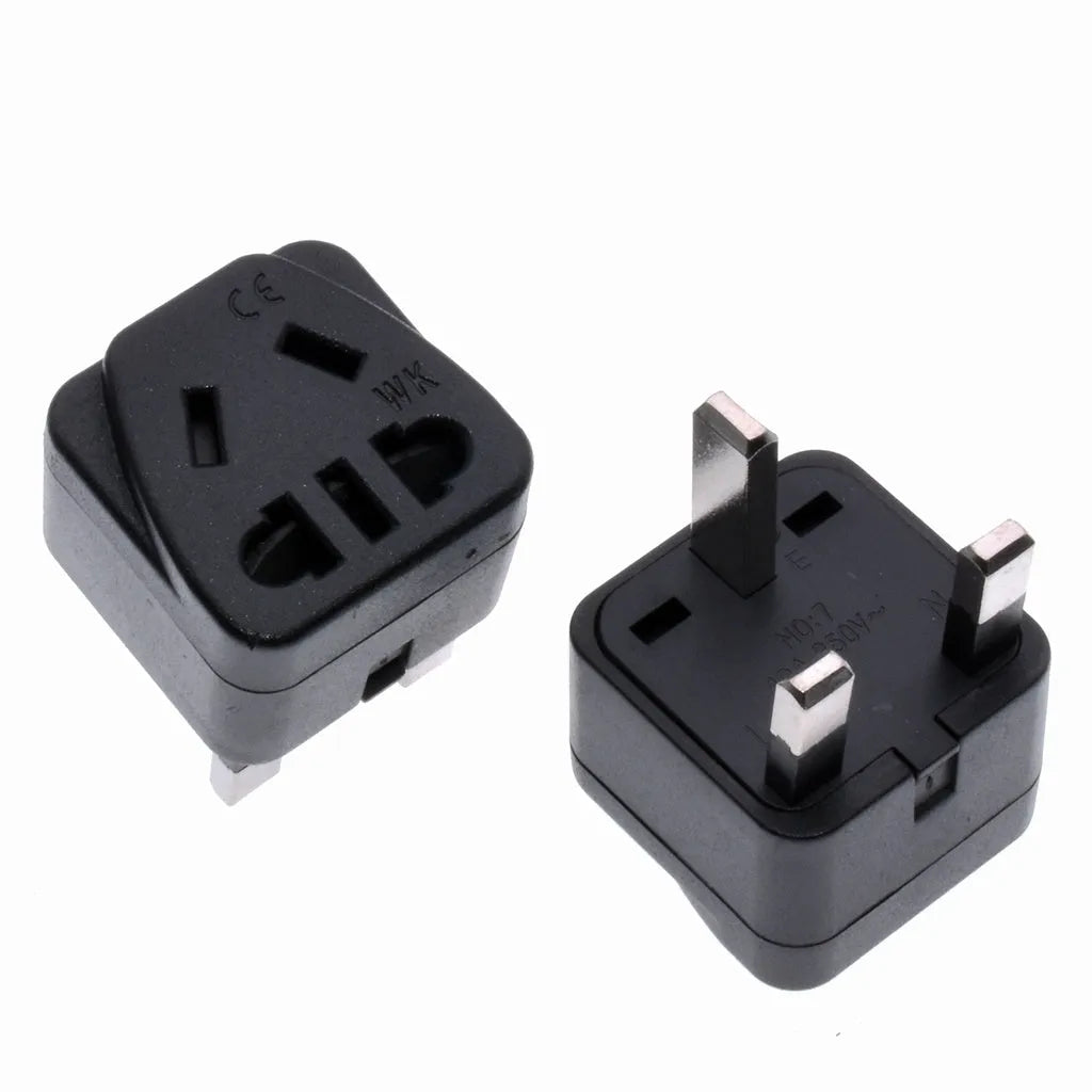 Square white universal power adapter with five UK three-pin sockets.