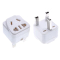 Square white universal power adapter with five UK three-pin sockets.