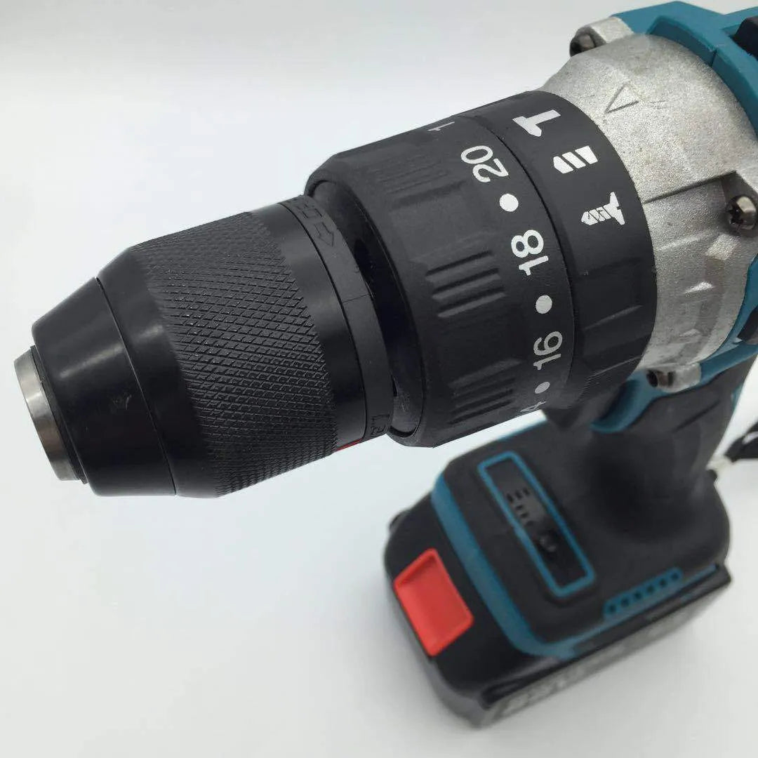 Black and yellow cordless impact drill with keyless chuck, shown with a lithium-ion battery and drill bit.