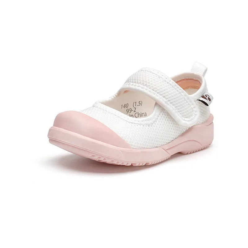 White children's cloth shoes with mesh upper and Velcro fastening for toddlers