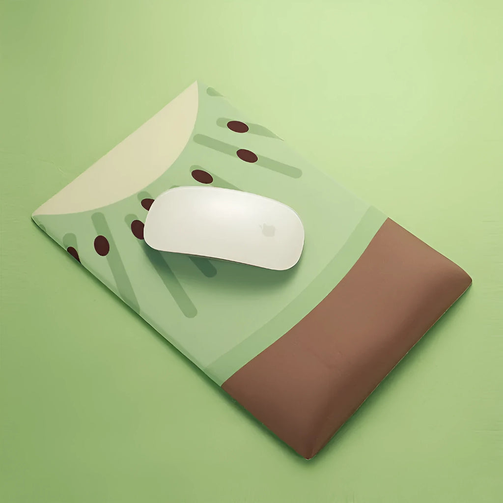 Green kiwi fruit design on a grey cloth mouse pad with a thick, curved wrist support cushion