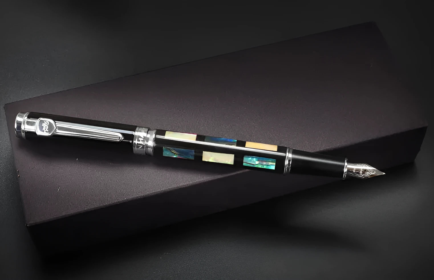Ceramic colour lacquer pen with rotating ink system and three nib sizes in metal shell with wood finish options