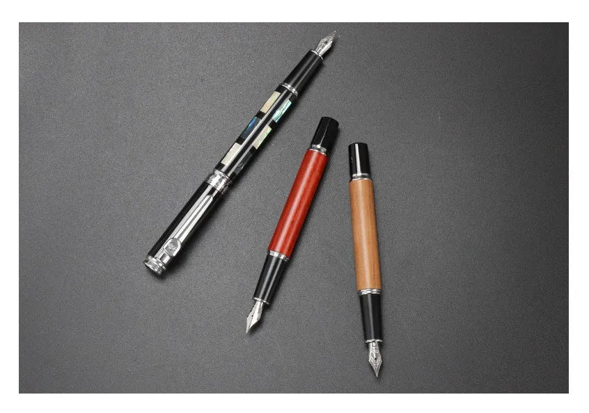 Ceramic colour lacquer pen with rotating ink system and three nib sizes in metal shell with wood finish options