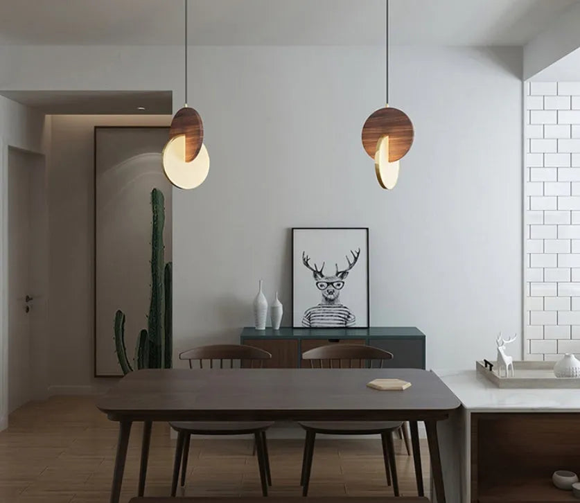 Long-line carved walnut wood wall chandelier with warm white LED light.