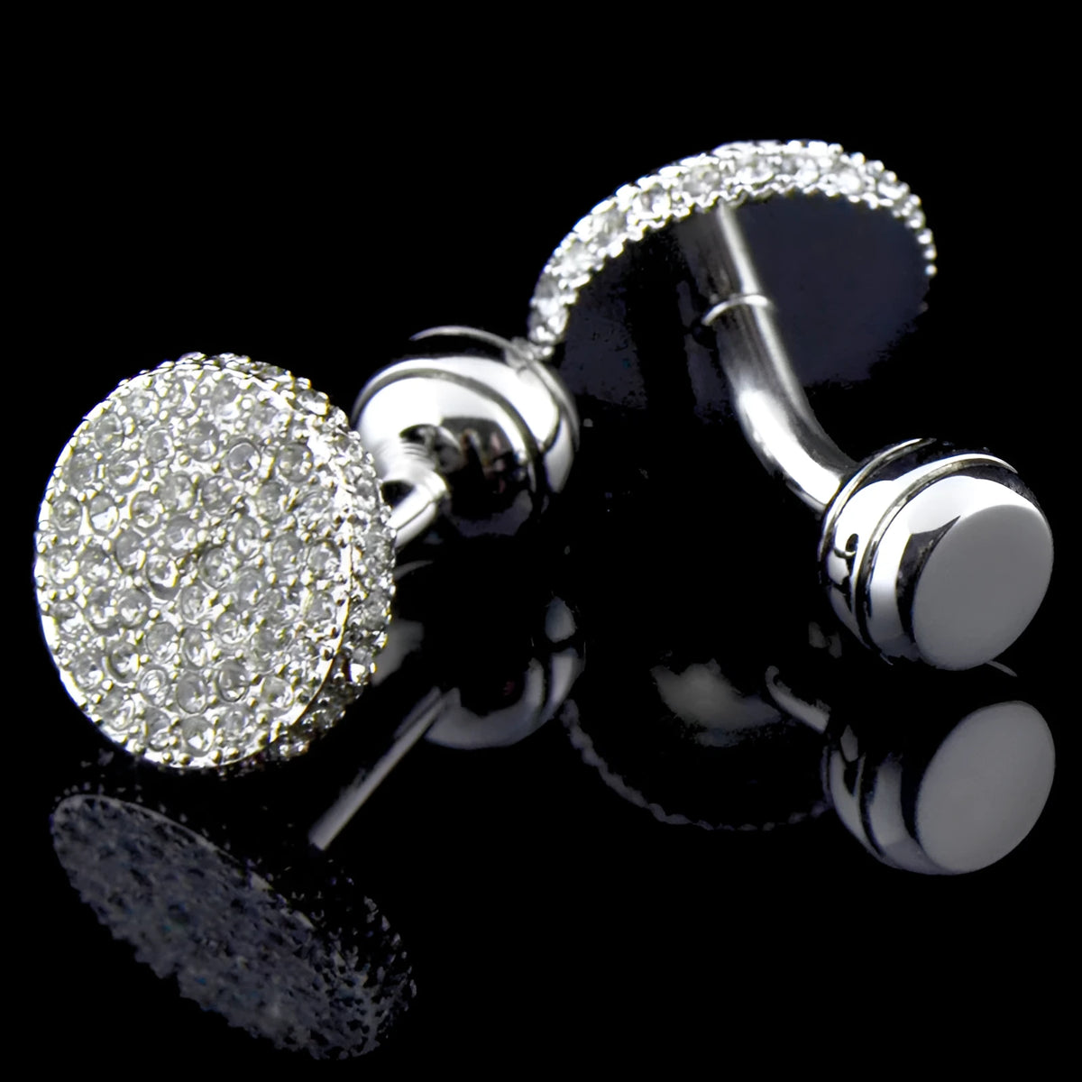 Pair of round 18mm crystal full rhinestone cufflinks with button with feet fastening on white background