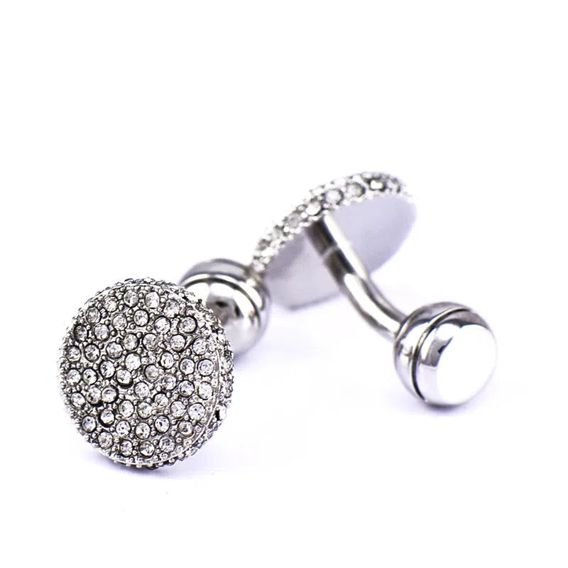 Pair of round 18mm crystal full rhinestone cufflinks with button with feet fastening on white background